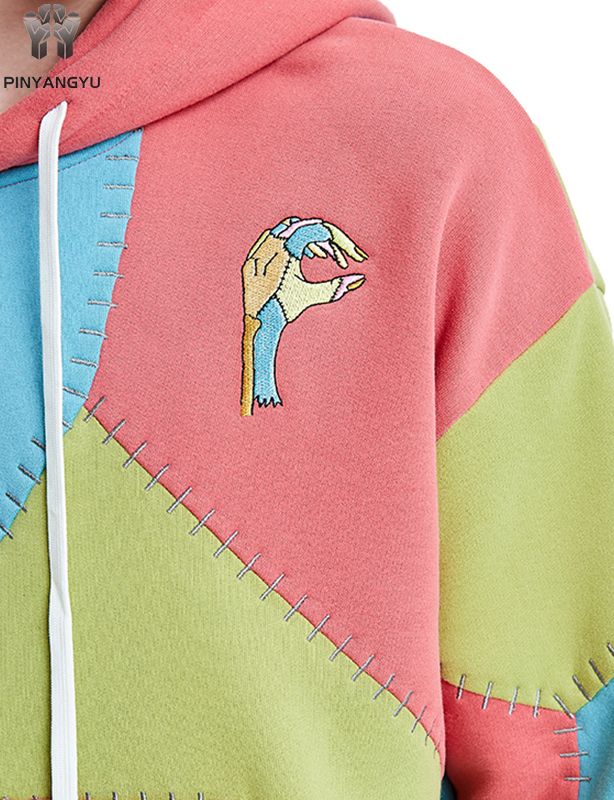 Customized hooded sweatshirt with multi piece fabric and multi-color splicing effect